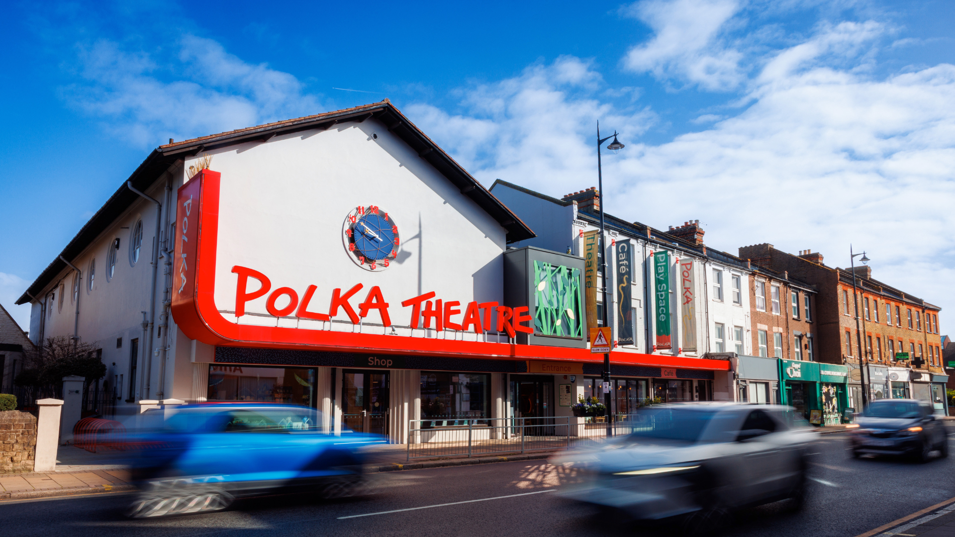 An outside shot of the Polka Theatre during the day.